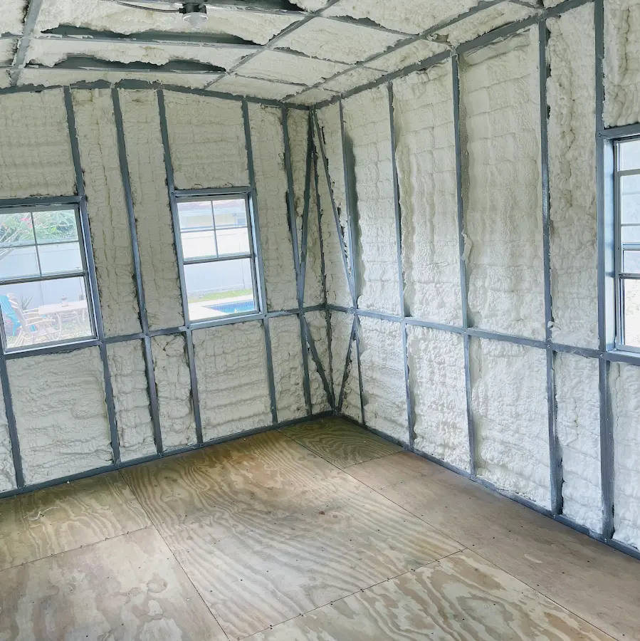 Closed-cell spray foam insulation applied to wall cavities in a residential project in New Canaan
