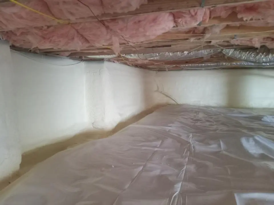 Crawl space encapsulation with closed-cell spray foam for Storm Damage Roof Repair in New Canaan